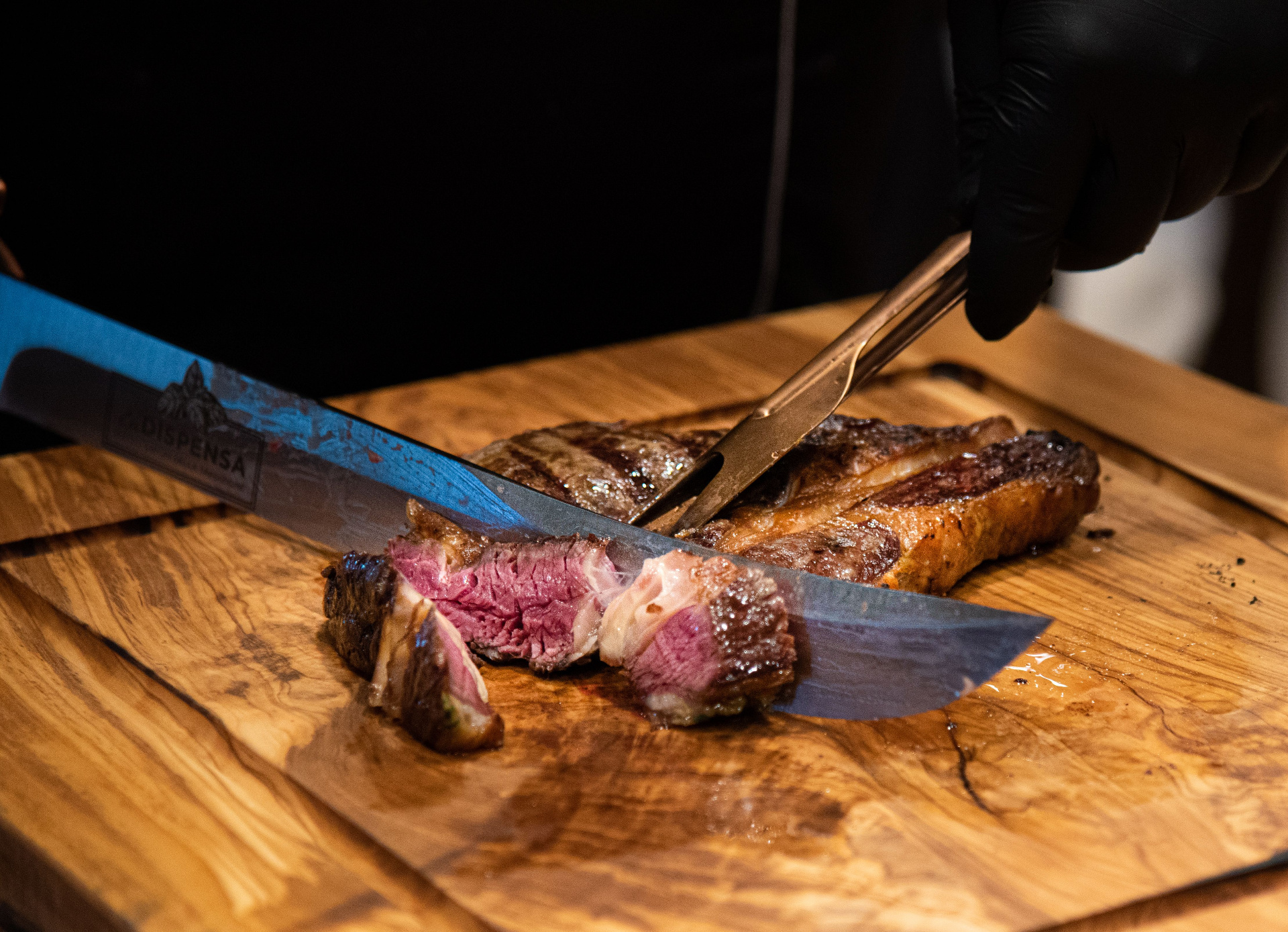 Chef slicing a steak
